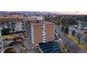 Brick building with balconies offers city views in a convenient location near parks and community amenities at 4800 E Hale Pkwy # 712N, Denver, CO 80220