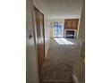 Living room with fireplace and access to balcony at 14751 E Tennessee Dr # 226, Aurora, CO 80012