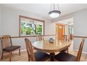 Inviting dining room with hardwood floors and natural light at 7351 S Sheridan Ct, Littleton, CO 80128