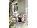 Relaxing front porch area with patio furniture, perfect for enjoying the outdoors at 1272 S Milwaukee St, Denver, CO 80210