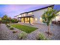 Wonderful outdoor space with a covered porch, low-maintenance landscaping and gravel at 455 Rogers Way, Castle Rock, CO 80104