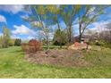 Scenic neighborhood featuring mature trees, green lawns, and a charming welcome sign for Westerly Park at 7220 Spring Creek Cir, Niwot, CO 80503