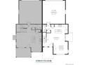 Detailed first floor plan featuring a spacious layout, open concept living, kitchen, dining area and a two-car garage at 3865 W 82Nd Ln, Westminster, CO 80031