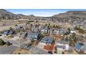 Aerial view of the house showcasing its location within a neighborhood with parks and mountain views at 1304 5Th St, Golden, CO 80403