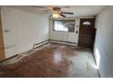 Living room with hardwood floors and ceiling fan at 6500 W 14Th Ave, Lakewood, CO 80214