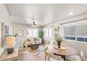 Cozy living room featuring a comfy couch and wood floors at 739 Widgeon Cir, Longmont, CO 80503