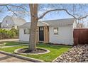 Lovely home with manicured lawn, rock garden and mature trees in a desirable location at 1130 Orchard St, Golden, CO 80401
