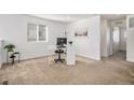 Bright office space with large window, desk and chair, perfect for remote work at 3389 Cranston Cir # 3389, Highlands Ranch, CO 80126