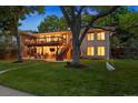Outdoor entertaining is made easy in this backyard with deck and tree swing at 13693 W Utah Cir, Lakewood, CO 80228