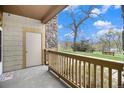 Private outdoor patio with a view of green space, offering a relaxing area for enjoying nature at 8039 Lee Dr # 2, Arvada, CO 80005