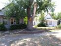 Street view of a home surrounded by a well-kept brick garden at 1346 S Logan St, Denver, CO 80210