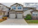 Charming townhome with stone accents and a two-car garage, perfect for modern living at 23070 York Ave, Parker, CO 80138