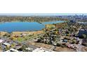 Breathtaking aerial view of Sloan's Lake neighborhood, showcasing lake and city skyline views at 1634 N Sheridan Blvd # 101, Denver, CO 80204