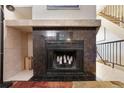 Inviting fireplace with decorative candles at 17664 E Loyola Dr # C, Aurora, CO 80013