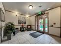 Well-maintained lobby with neutral tones, tiled floor, waiting area, and secured entrance at 1379 Charles # 4, Longmont, CO 80503
