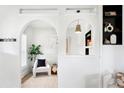 Bright living area with archways and modern decor at 4134 Bryant St, Denver, CO 80211