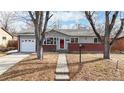 Charming single-story home with brick accents and a well-maintained front yard at 3246 S Stuart St, Denver, CO 80236