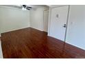 Cozy living room features sleek hardwood floors and great natural lighting at 12166 Melody Dr # 202, Denver, CO 80234