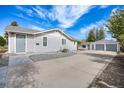 Charming single-Gathering home with well-maintained front yard and detached two-car garage at 3249 W Alaska Pl, Denver, CO 80219