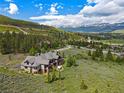 Beautifully landscaped property featuring a gorgeous mountain home with spectacular views of the surrounding mountains at 174 Sage Dr, Breckenridge, CO 80424