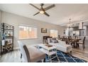 Open concept dining area with table and chairs adjacent to kitchen at 725 Osceola St, Denver, CO 80204