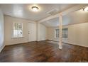 Spacious living room with new flooring and natural light, creating a welcoming atmosphere at 4533 N Pennsylvania St, Denver, CO 80216