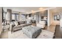 Cozy living room featuring modern decor, plush seating, and ample natural light at 1750 Wewatta St # 704, Denver, CO 80202