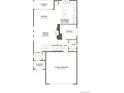 First-floor plan showcasing a gourmet kitchen, study, great room, dining area, and two-car garage at 11205 Mount Emma Dr, Englewood, CO 80112