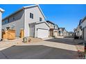 Spacious two-car garage with a modern design and ample parking space at 2662 E 103Rd Ave, Thornton, CO 80229