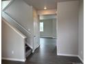 Bright foyer with wood flooring and gray walls welcomes you home at 1759 Jennifer St, Brighton, CO 80601