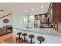 Spacious kitchen with granite countertops and stainless steel appliances at 8036 E 53Rd Dr, Denver, CO 80238