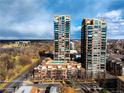 Stunning aerial view of two high-rise towers with pools and lush landscaping at 1674 Fillmore St # Al3, Denver, CO 80206