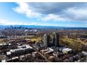 Breathtaking aerial view of the city skyline showcasing the property's prime location at 1674 Fillmore St # Al3, Denver, CO 80206