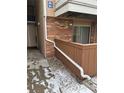 Condo building exterior with patio view, showing the layout and design at 3328 S Ammons St # 4-104, Lakewood, CO 80227
