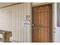 Welcome to unit 53, featuring a secured entrance door and a welcoming sign at 1358 S Irving St # 53, Denver, CO 80219