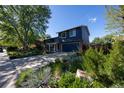 Charming two-story home with a well-manicured front yard and a spacious driveway in a desirable neighborhood at 1424 Cypress Cir, Lafayette, CO 80026