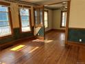 Bright dining room featuring large windows and an elegant chandelier fixture at 1646 Galena St, Aurora, CO 80010