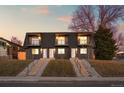 Charming exterior showcasing well-maintained duplex with symmetrical design and inviting staircases at 2890 S Sherman St, Englewood, CO 80113
