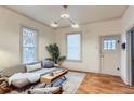 Bright living room featuring hardwood floors, natural light, and modern decor at 109 W Simpson St, Lafayette, CO 80026