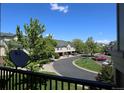 Balcony view of well maintained landscape and neighborhood street at 1652 Egret Way, Superior, CO 80027