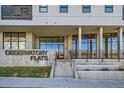 Exterior view of Observatory Flats building with modern architecture and street access at 2374 S University Blvd # 204, Denver, CO 80210
