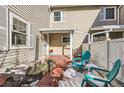 Cozy brick patio with seating area, perfect for relaxing at 3242 S Heather Gardens Way, Aurora, CO 80014