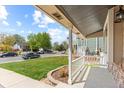 Charming front porch view offering a glimpse of the neighborhood street at 13244 Quivas St, Denver, CO 80234