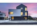 Stunning modern home with unique architectural design and eye-catching mixed material exterior at 10163 W 38Th Ave, Wheat Ridge, CO 80033