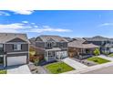 Lovely aerial view of a two-story home in a well-kept neighborhood at 760 N Allium St, Watkins, CO 80137