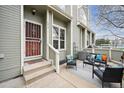 Inviting outdoor patio area with stylish furniture, perfect for relaxing and entertaining at 5875 W Asbury Pl, Lakewood, CO 80227