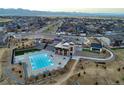 Community pool and clubhouse with expansive mountain views at 8636 Hotchkiss St, Littleton, CO 80125