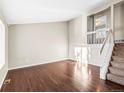 Bright living room featuring hardwood floors and natural light at 19136 E Milan Cir, Aurora, CO 80013