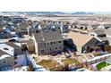 Backyard with patio, firepit, and mountain views at 9170 Fig St, Arvada, CO 80005