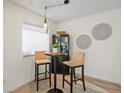 Cozy dining nook with a modern pendant light fixture and stylish decor at 7379 S Gore Range Rd # 304, Littleton, CO 80127